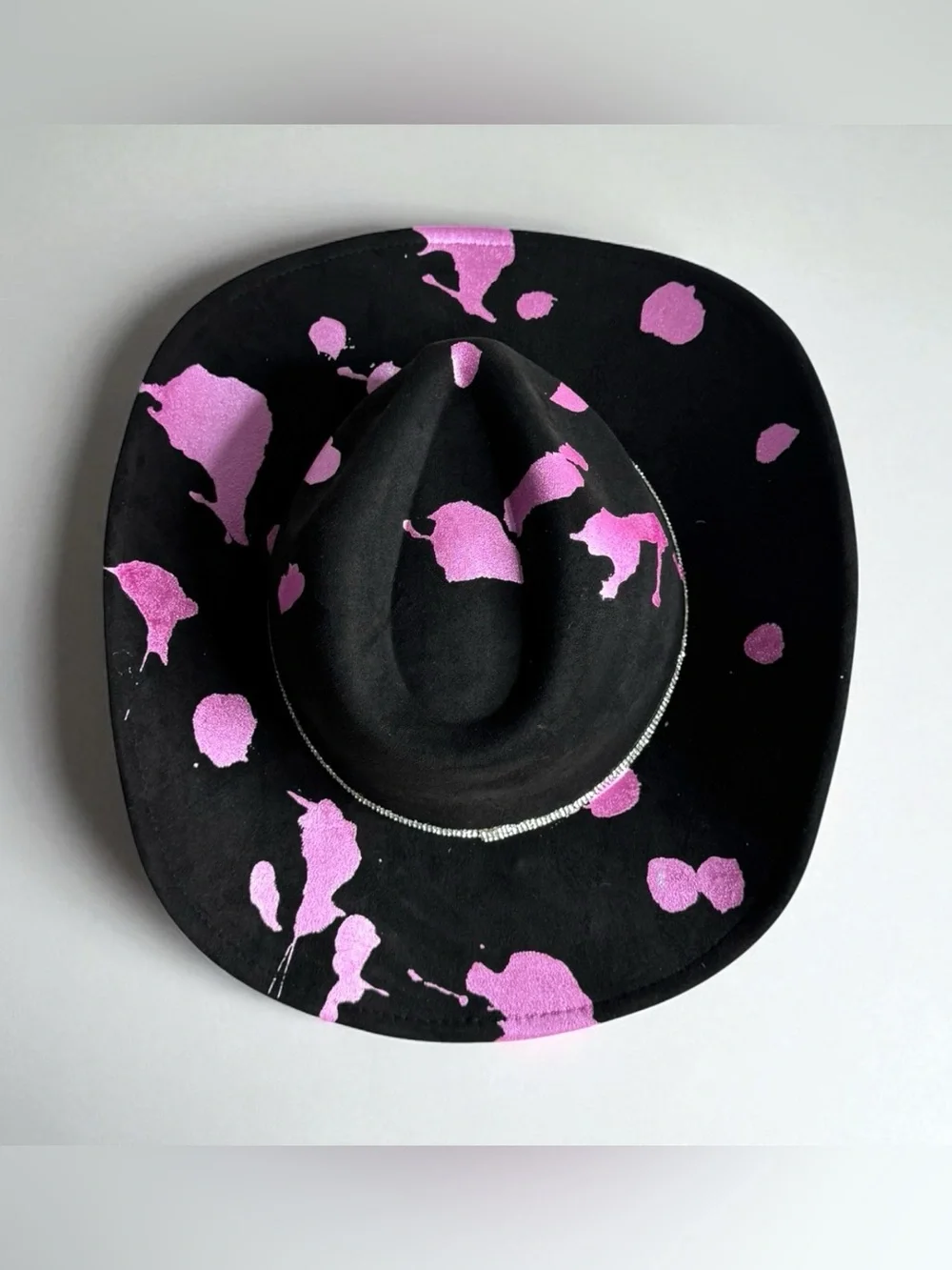 Black Cowboy Hat with Pink Accents and Star Embellishments